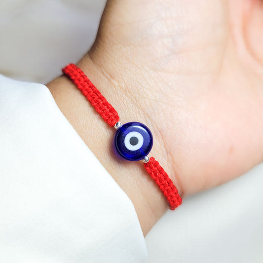Pulsera ojo turco Azul e Hilo rojo aclilico