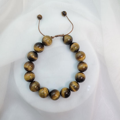Pulsera Ojo de tigre cuarda 10mm