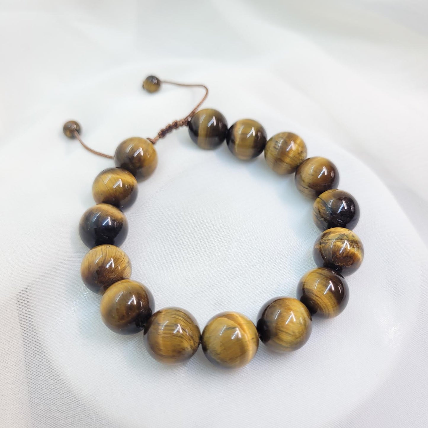 Pulsera Ojo de tigre cuarda 10mm