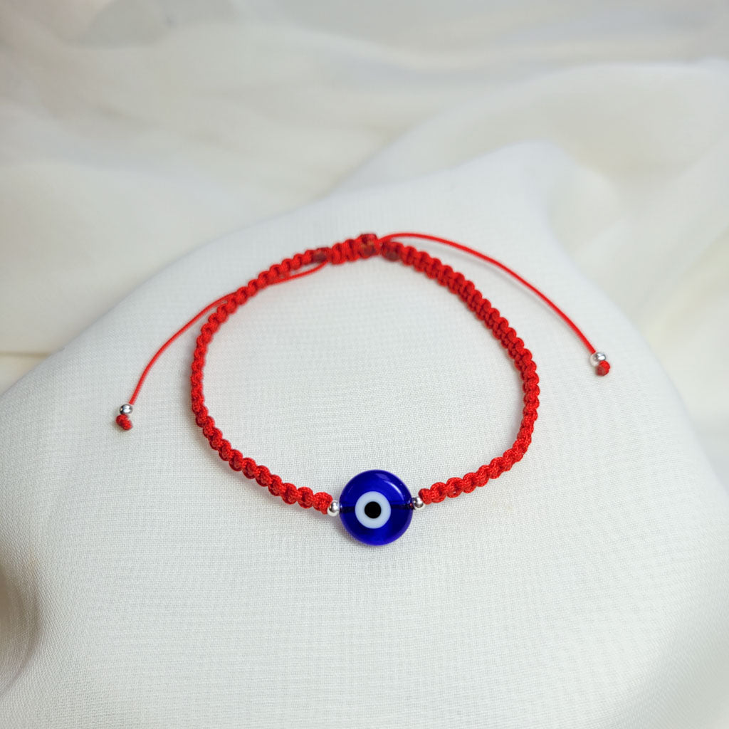 Pulsera ojo turco Azul e Hilo rojo aclilico